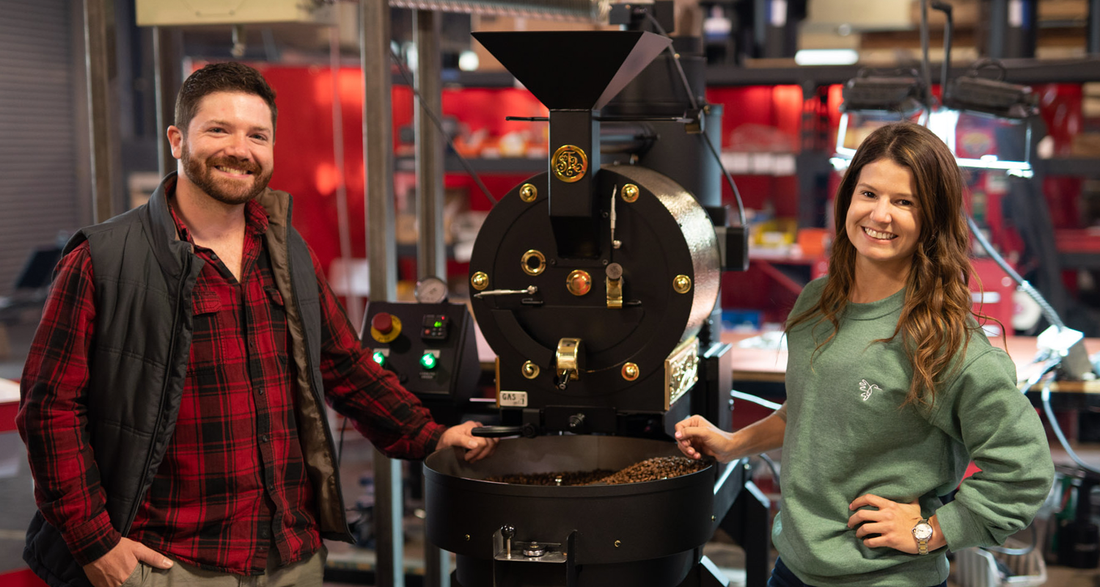 Maria Mejia and Jimmy Martin, who started Colibri Mountain Coffee to share their love with Colombia and America stand before a San Franciscan coffee roaster